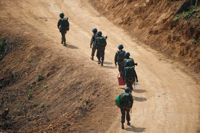 (File) Soldiers walk near the command center during the first day of 'Sin Phyu Shin' joint military exercises in Ayeyarwaddy delta region, Myanmar. Photo: EPA