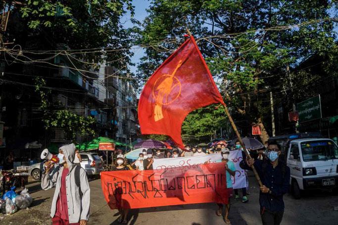 Citizens of Myanmar protest on the streets of Yangon on Feb. 11. (AFP-Yonhap)