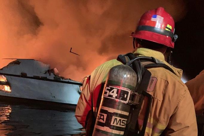 In this photo released by the Ventura County Fire Department, firefighters attempt to extinguish a blaze on a boat off the coast of Santa Cruz Island, California; it later sank (AFP Photo/HO)