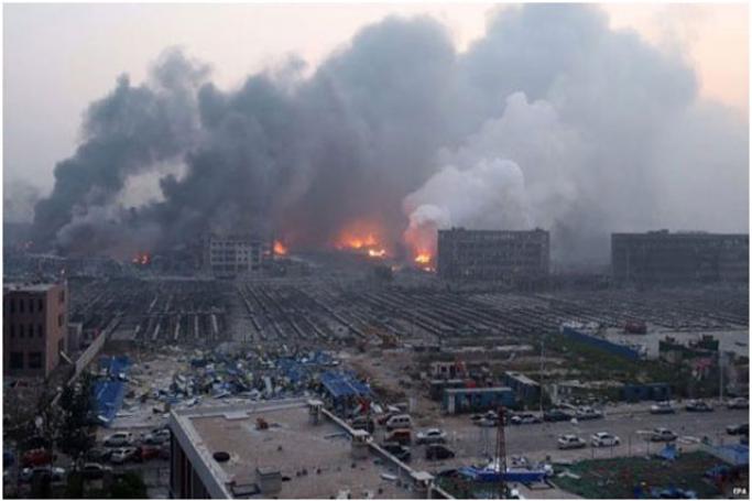 ပေါက်ကွဲမီးလောင်သွားသည့် တရုတ် တီယန်ကျင်းဆိပ်ကမ်းမြင်ကွင်း။ ဓာတ်ပုံ- EPA