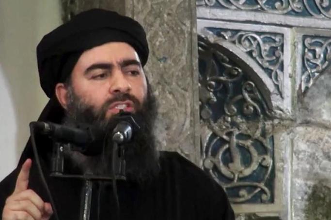 This file image made from video posted on a militant website on July 5, 2014, purports to show the leader of the Islamic State group, Abu Bakr al-Baghdadi, delivering a sermon at a mosque in Iraq during his first public appearance. (AP file photo) 