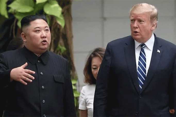 North Korea's leader Kim Jong Un (left) and US President Donald Trump talk in the garden of the Metropole hotel during the second North Korea-US summit in Hanoi, Vietnam, on Feb 28, 2019. (REUTERS/Leah Millis/File Photo)