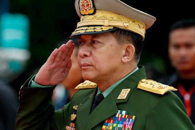 (File) Myanmar military commander-in-chief Senior General Min Aung Hlaing salutes as he pays homage to late General Aung San and other leaders of the pre-independence Myanmar government during a ceremony marking the 71st Martyrs' Day at the Martyrs' Mausoleum in Yangon, Myanmar, 19 July 2018. Photo: Lynn Bo Bo/EPA