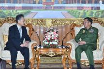 Then-Japanese Ambassador to Myanmar Tateshi Higuchi, left, meets with Commander-in-Chief Min Aung Hlaing in October 2017, in Naypyidaw, the capital of Myanmar.