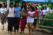 ၂၀၁၄ ခုနှစ် စက်တင်ဘာလ ၁၄ ရက်က ရန်ကုန်မြို့ ပြည်သူ့ရင်ပြင် တွင် ပြုလုပ်ကျင်းပသည့် မြန်မာနိုငံ လူကုန်ကူးမှူ တိုက်ဖျက်ရေးနေ့သို့ တက်ရောက်လာကြသည့် လူငယ်များအား တွေ့ရစဉ်။
ဓာတ်ပုံ-မဇ္ဈိမ